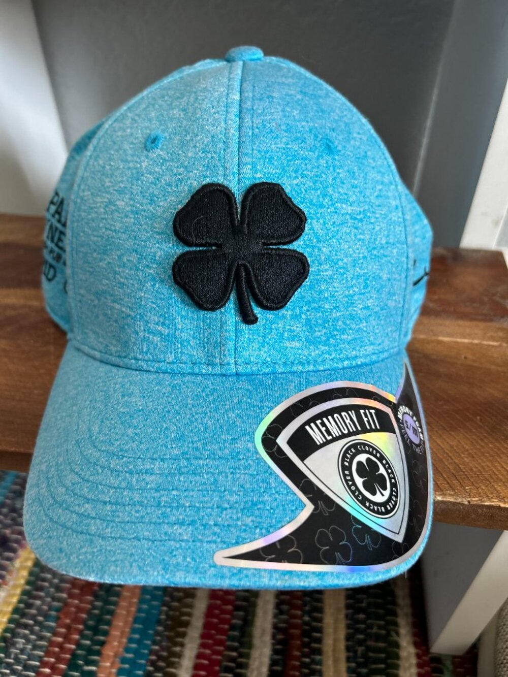 Black Clover Memory Fit Golf Hat S/M Blue Stretch Cap NWT Paddy O'Neill's Rapid